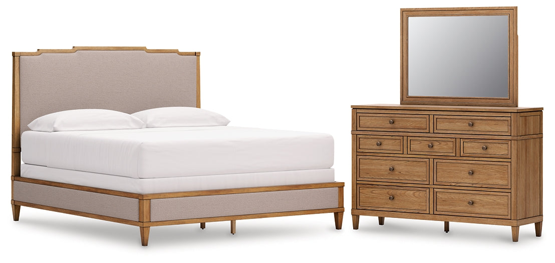 Sharlance California King Upholstered Panel Bed with Mirrored Dresser